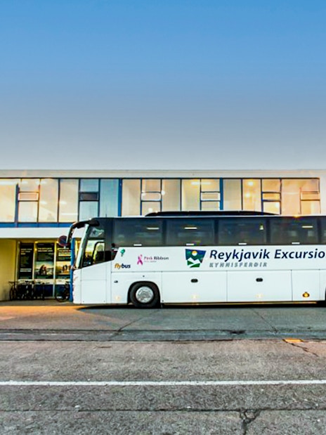 Reykjavik Excursions bus parked at BSI terminal for Keflavik Airport transfer.