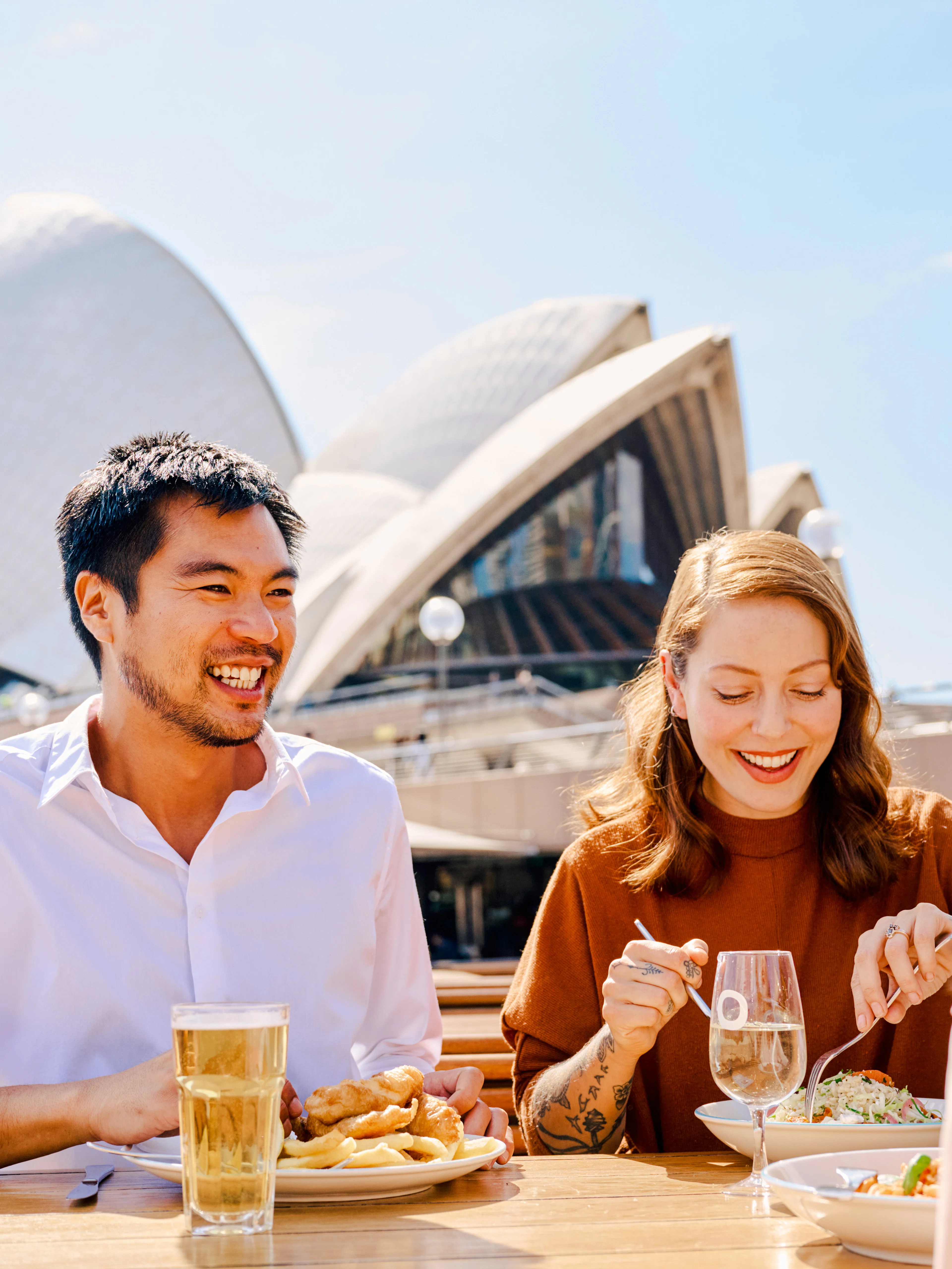Dining at Sydney Opera House with meals and drinks during guided tour.