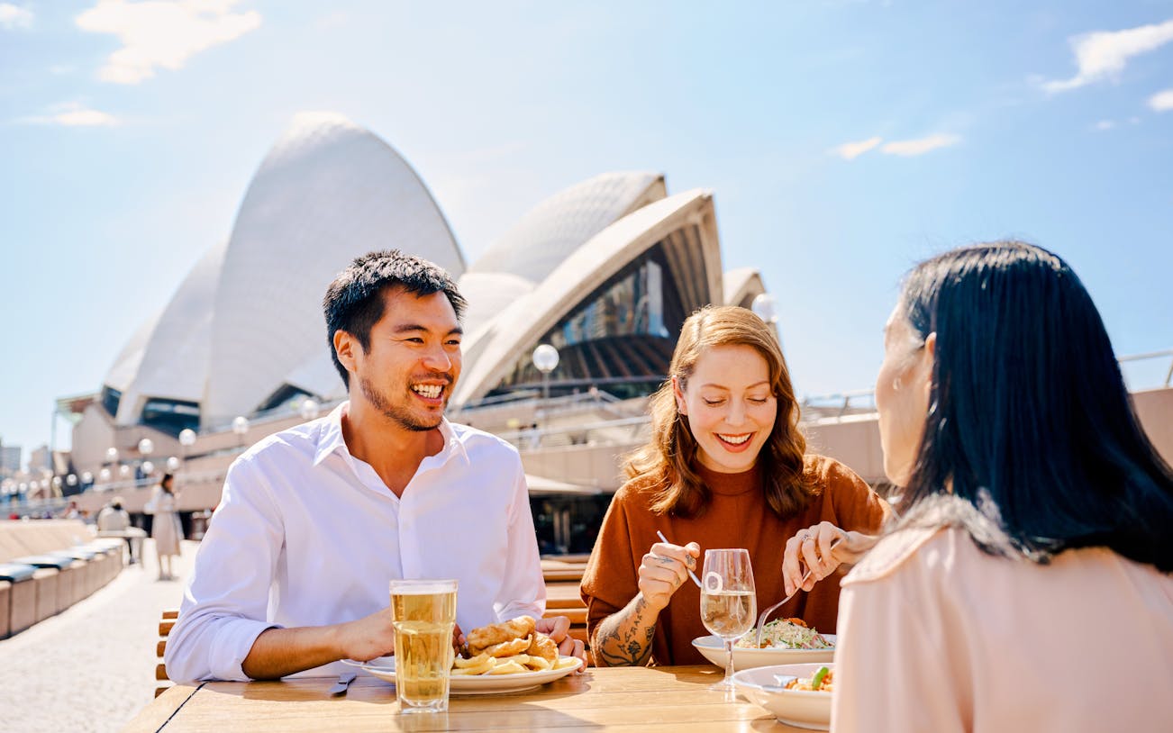 Dining at Sydney Opera House with meals and drinks during guided tour.