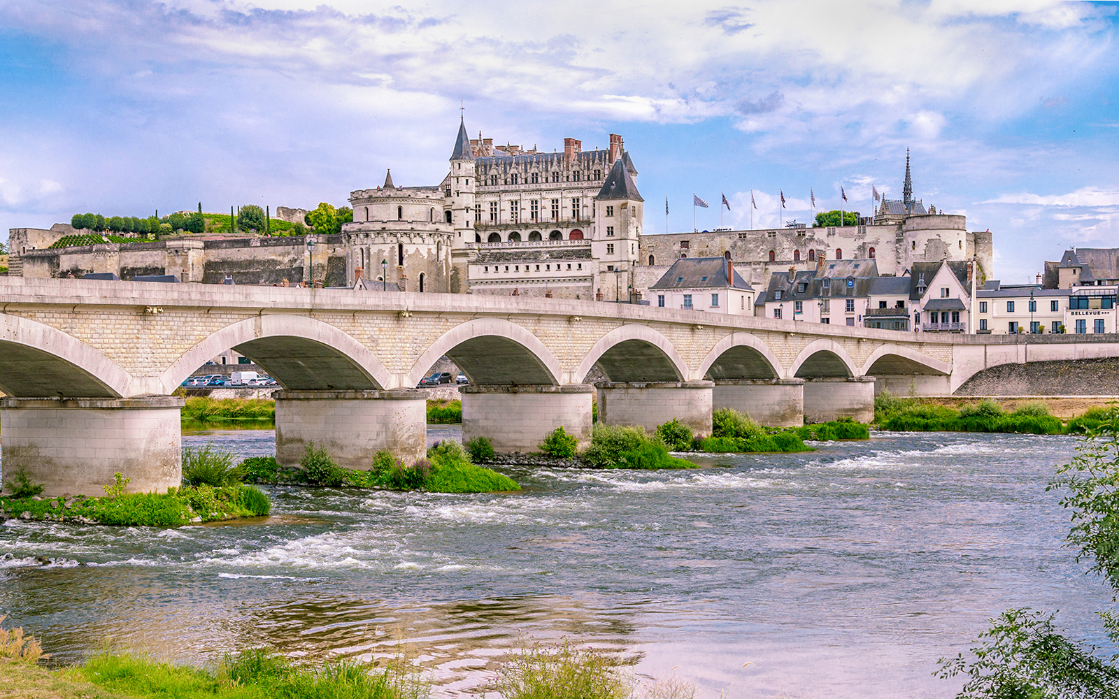 Royal Amboise Castle with bridge over Loire River, France.