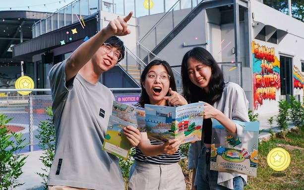 Young adults enjoying Ransack’s “The Somerville Adventure” puzzle hunt in Singapore.