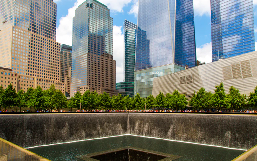North Pool at National September 11 Memorial Museum, New York City, with surrounding skyscrapers.