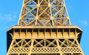 Eiffel Tower viewing platform with visitors, Paris Essentials City Pass.