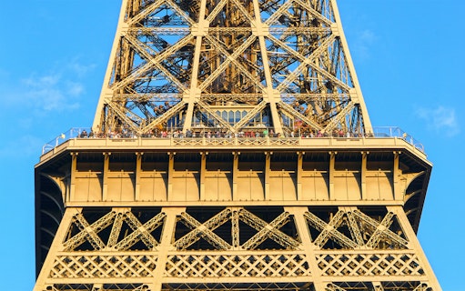 Eiffel Tower viewing platform with visitors, Paris Essentials City Pass.