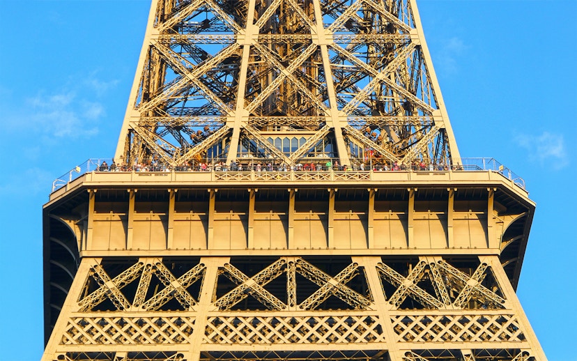 Eiffel Tower viewing platform with visitors, Paris Essentials City Pass.