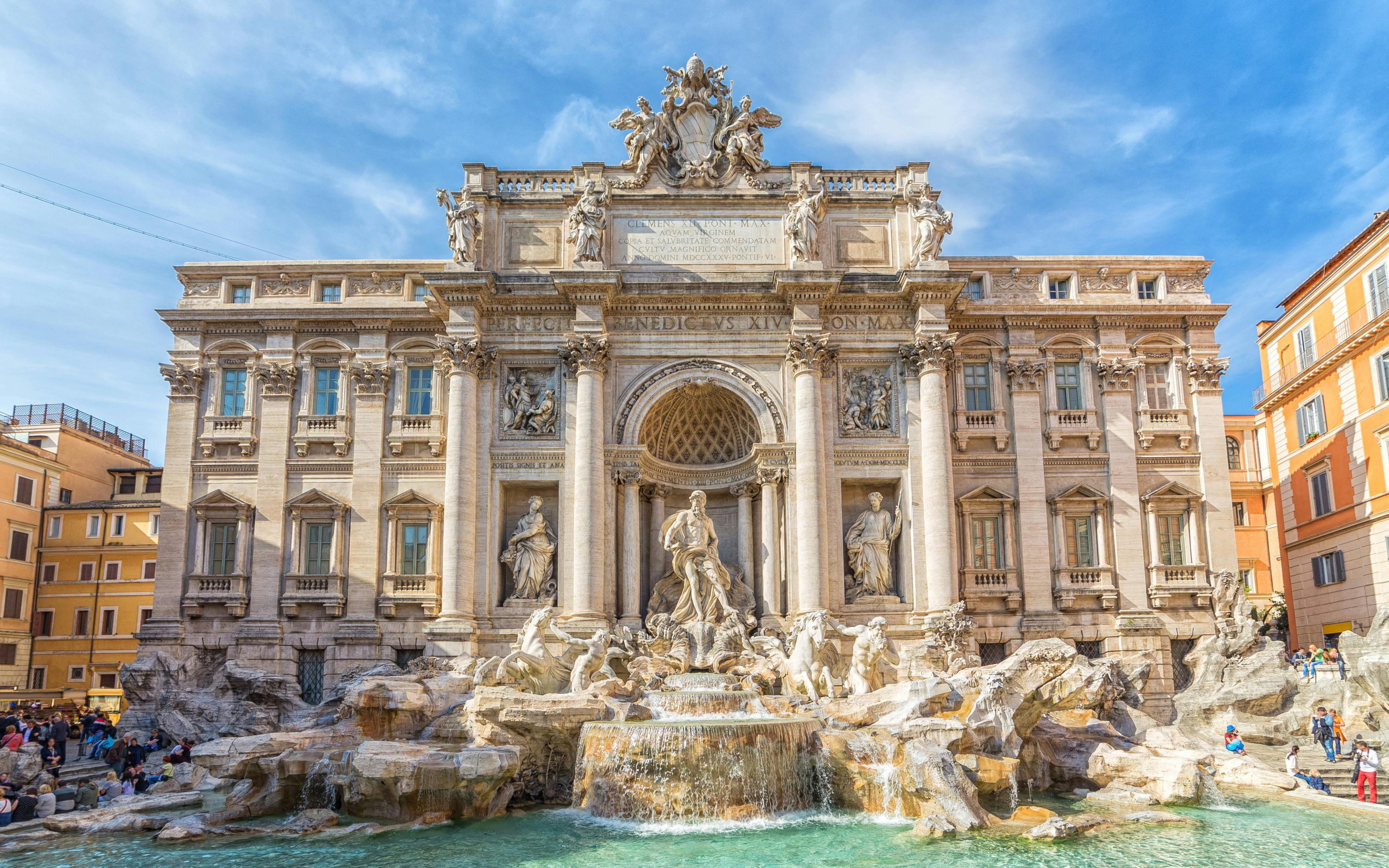 Trevi Fountain in Rome, Italy with sculptures and flowing water.