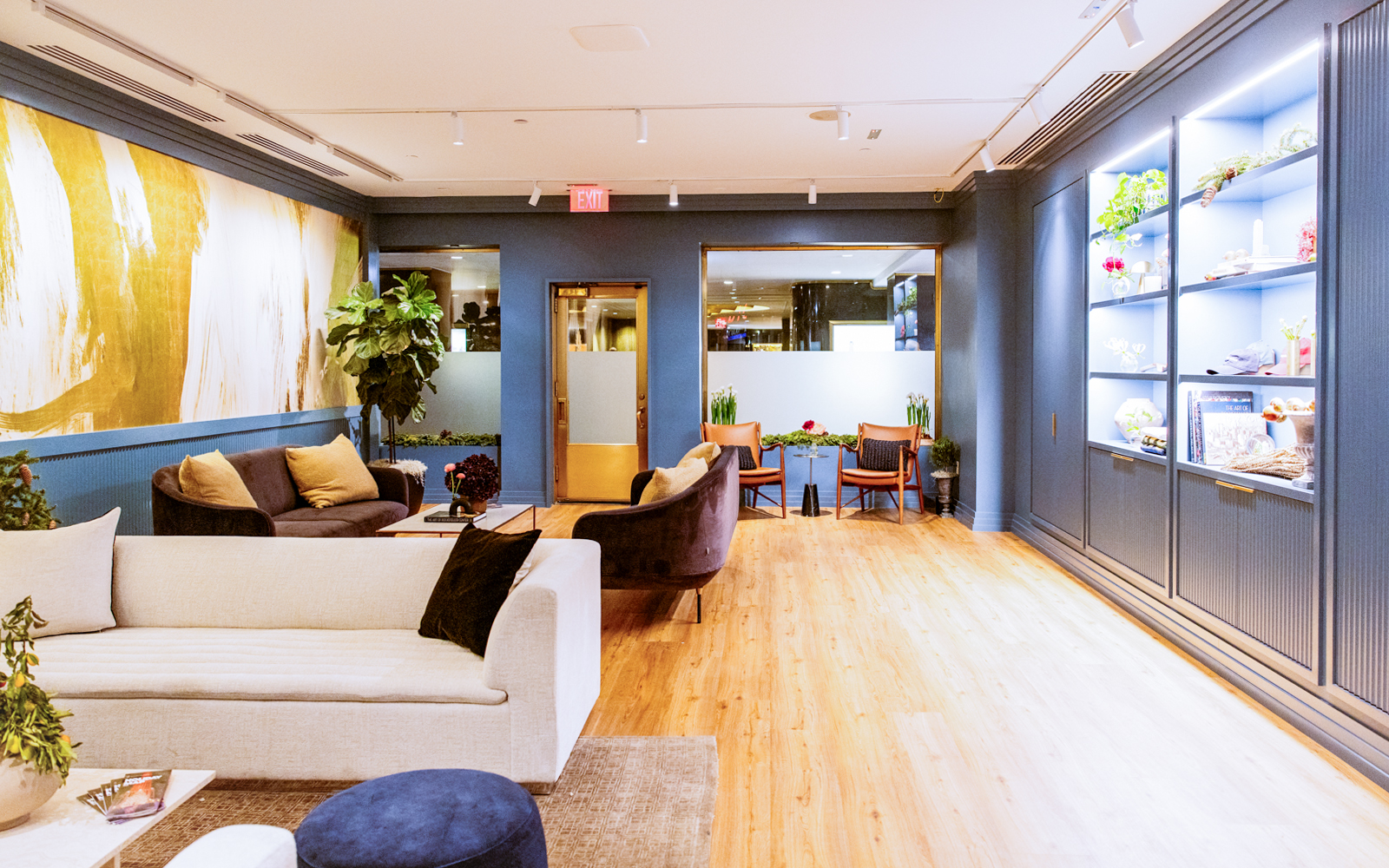 Luxurious lounge area at Rockefeller Center with modern decor and seating, part of the VIP Pass experience.