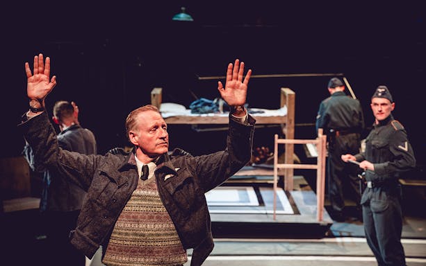 Theatrical scene from "Tom, Dick and Harry" with actors in military uniforms on stage.