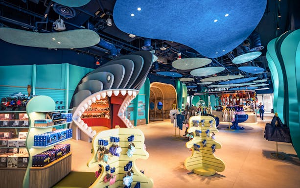 Singapore Oceanarium store interior with shark-themed entrance and merchandise displays.