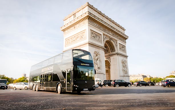 Bustronome Paris bus near Arc de Triomphe.