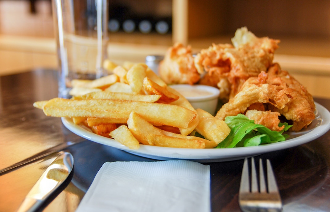 Fish and chips served at the winery cafe with a side of greens.