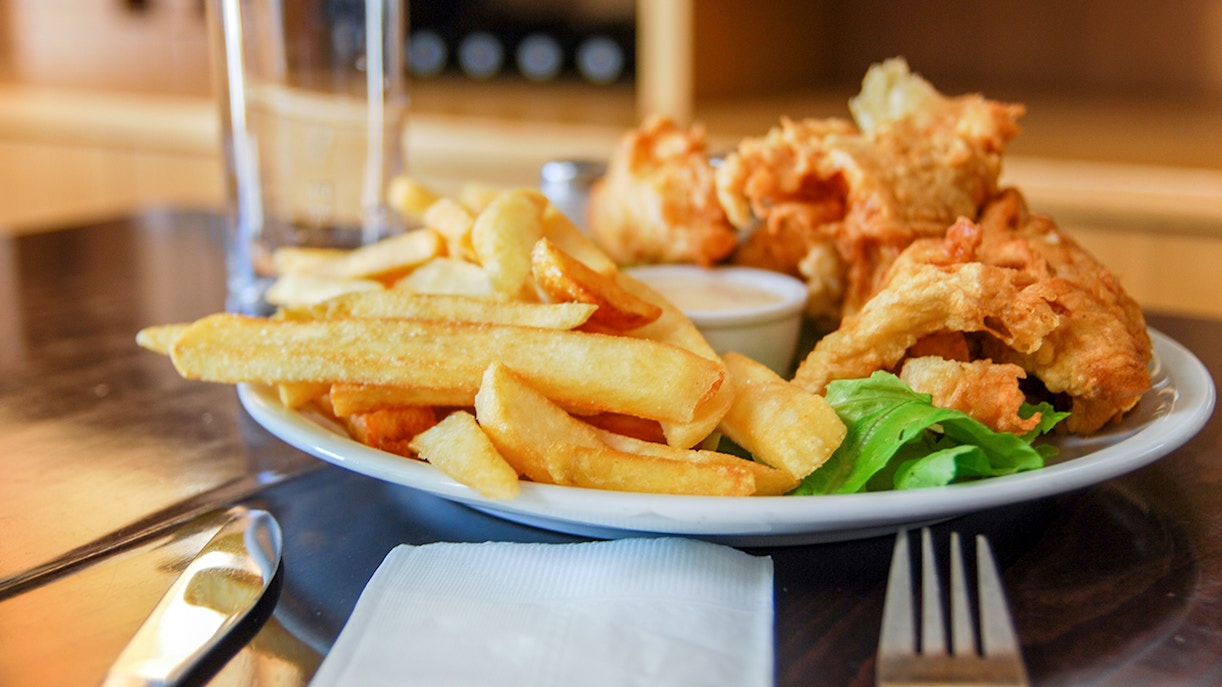 Fish and chips served at the winery cafe with a side of greens.