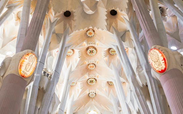 Sagrada Familia interior ceiling with intricate geometric designs, Barcelona.