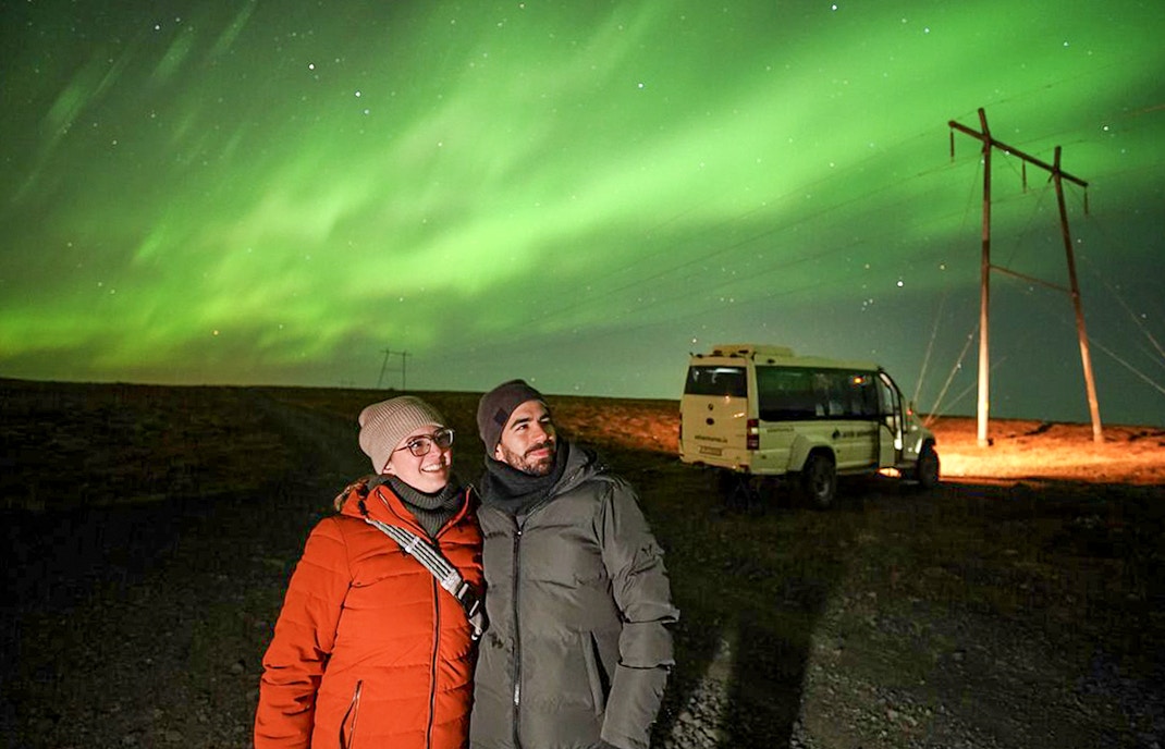Guests viewing northern lights on Premium Northern Lights Super Jeep Tour.