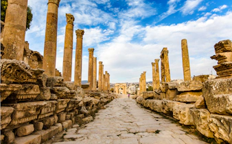 Ancient Roman columns lining the Cardo Maximus in Jerash, Jordan.