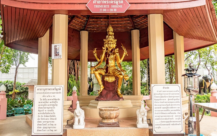 Trimurti Shrine statue with multiple arms in ancient city, Thailand.