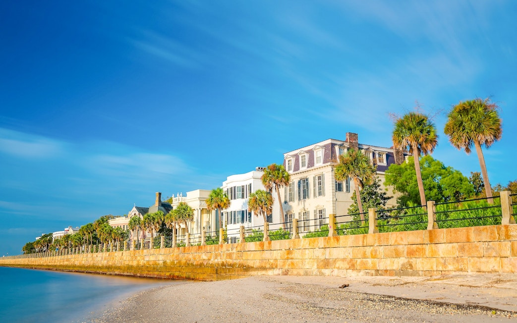 Historic homes and palm trees along the waterfront at Battery Park, Charleston.