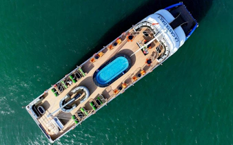 Aerial view of La Casta Day Cruise ship with pool in Ha Long Bay.