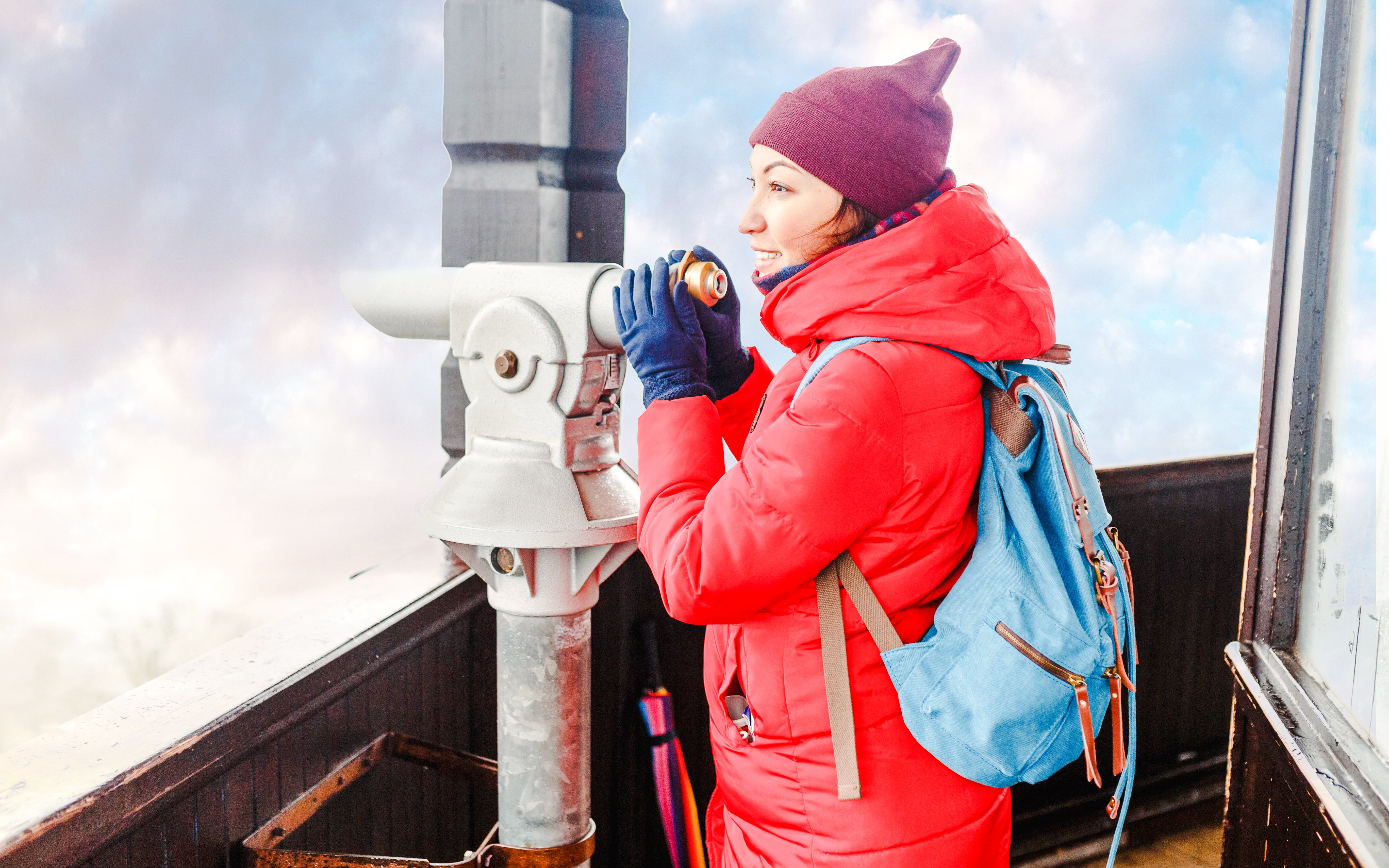 Visitor using a telescope at Diana Observation Tower.