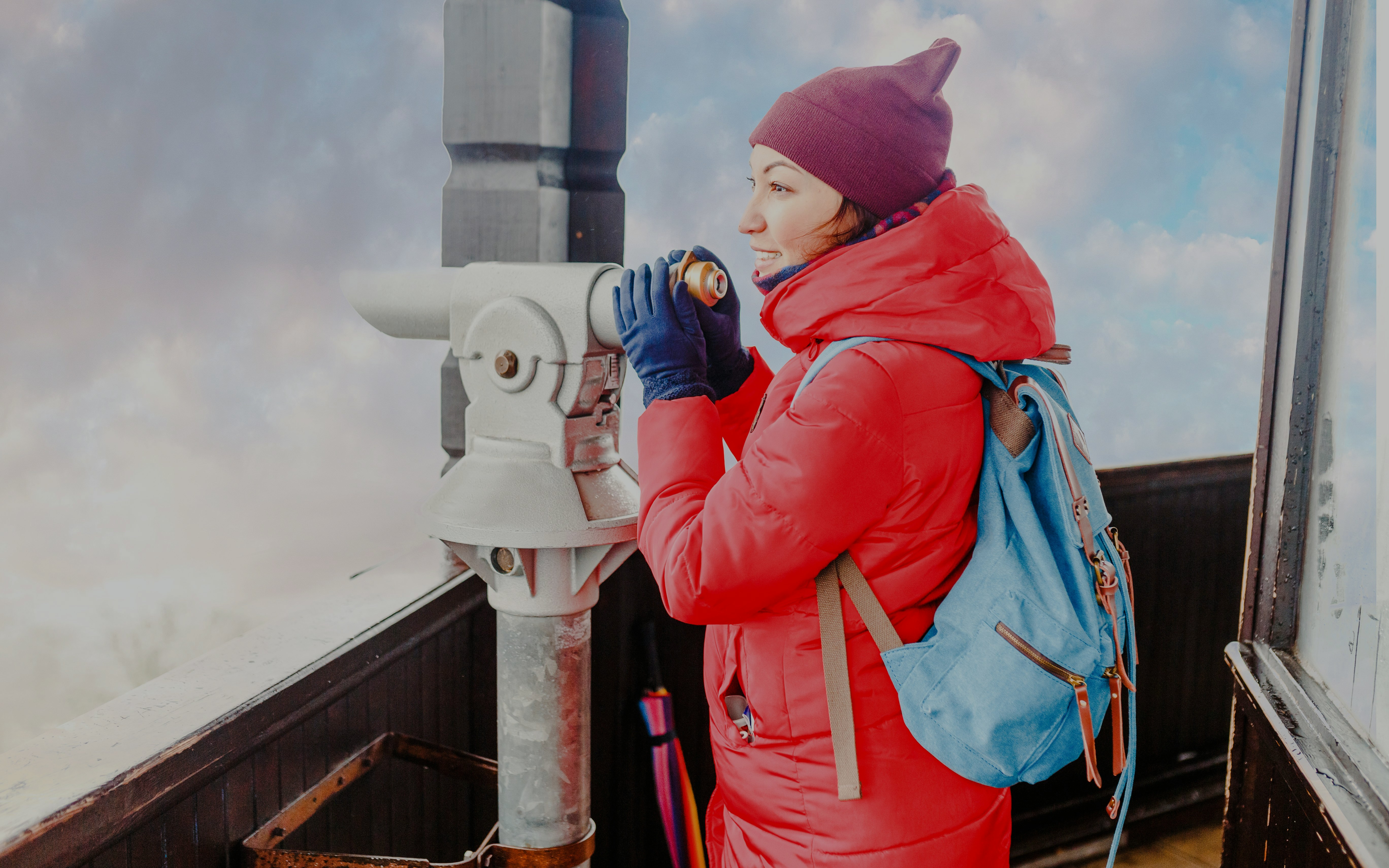 Visitor using a telescope at Diana Observation Tower.