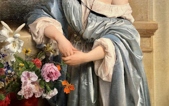 Woman in blue robe holding hands near flowers, Pinacoteca di Brera.