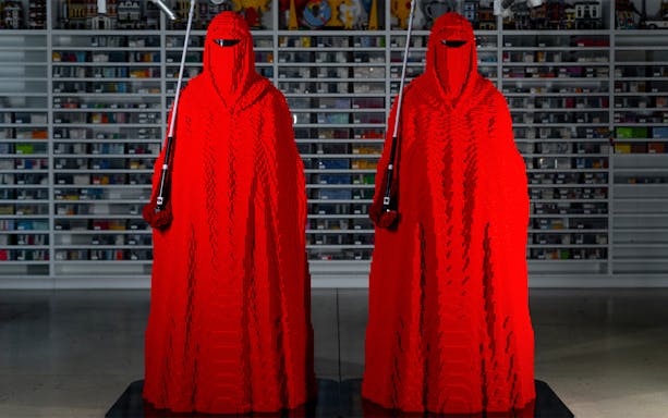 LEGO Star Wars models on display at Melbourne exhibition, featuring iconic characters and scenes.