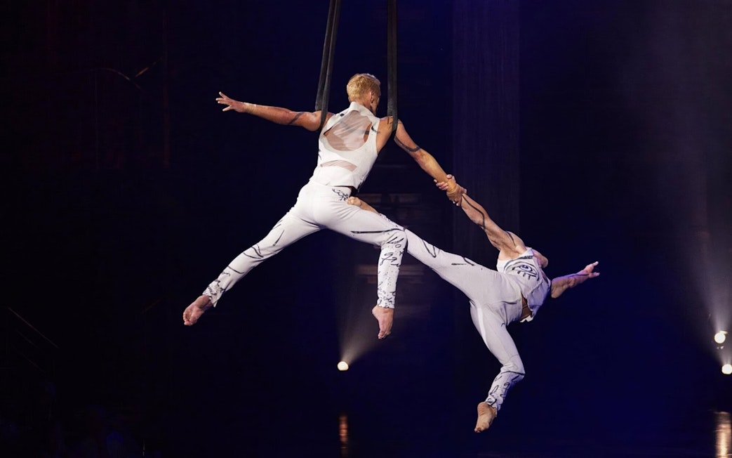Acrobats performing aerial act at Cirque du Soleil Joya Show.