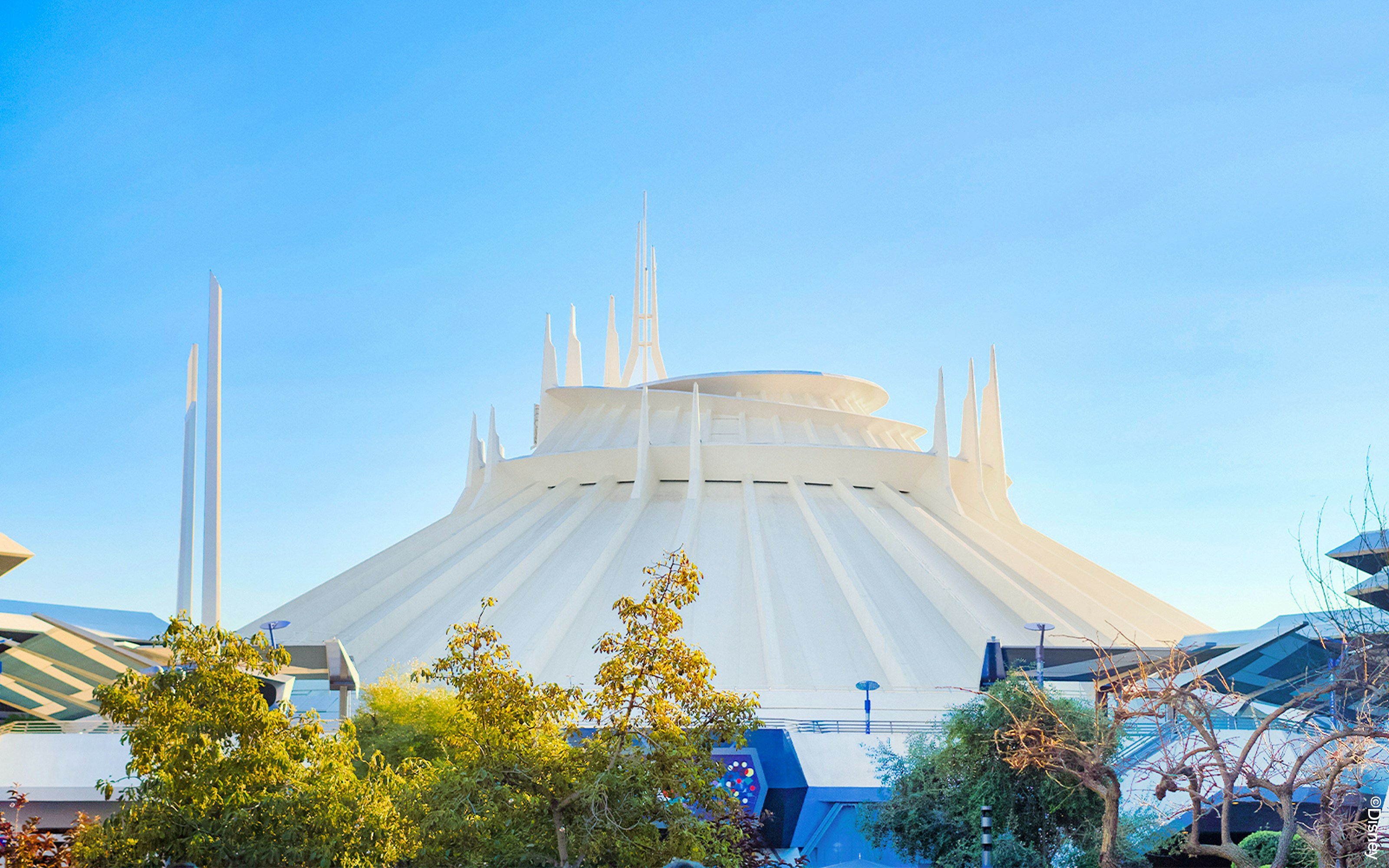 Space Mountain attraction at Disneyland Park, California, with futuristic architecture.