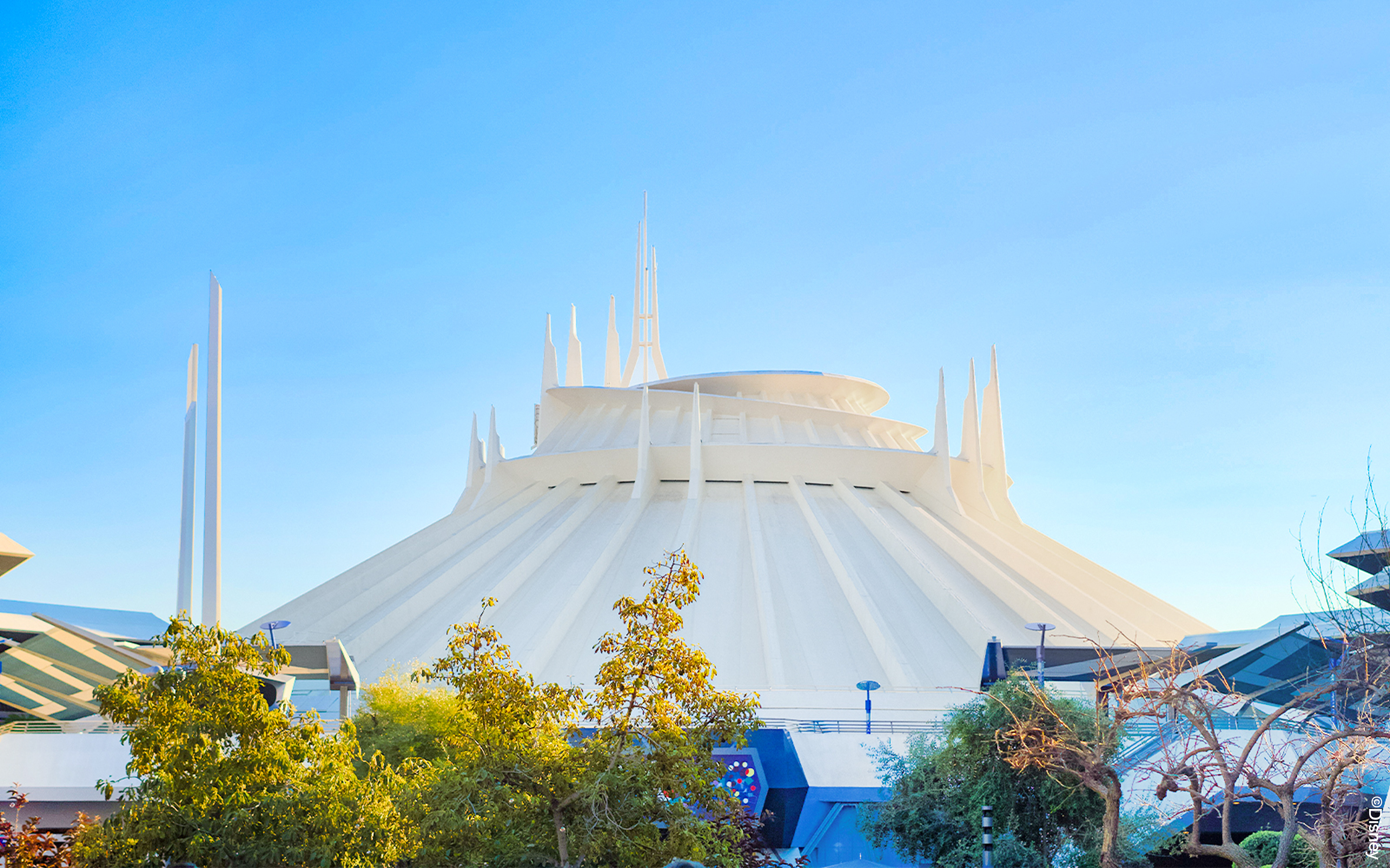 Space Mountain attraction at Disneyland Park, California, with futuristic architecture.