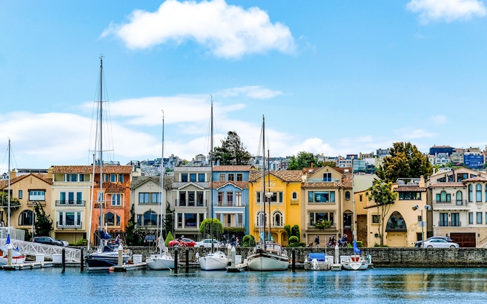 Colorful houses and sailboats along the waterfront in Sausalito, near San Francisco.