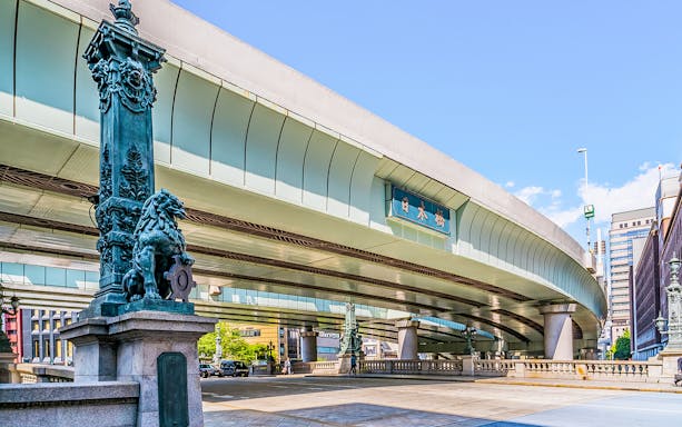 Nihonbashi Bridge in Tokyo, featuring ornate lion statues, part of the Skytree go-karting route.