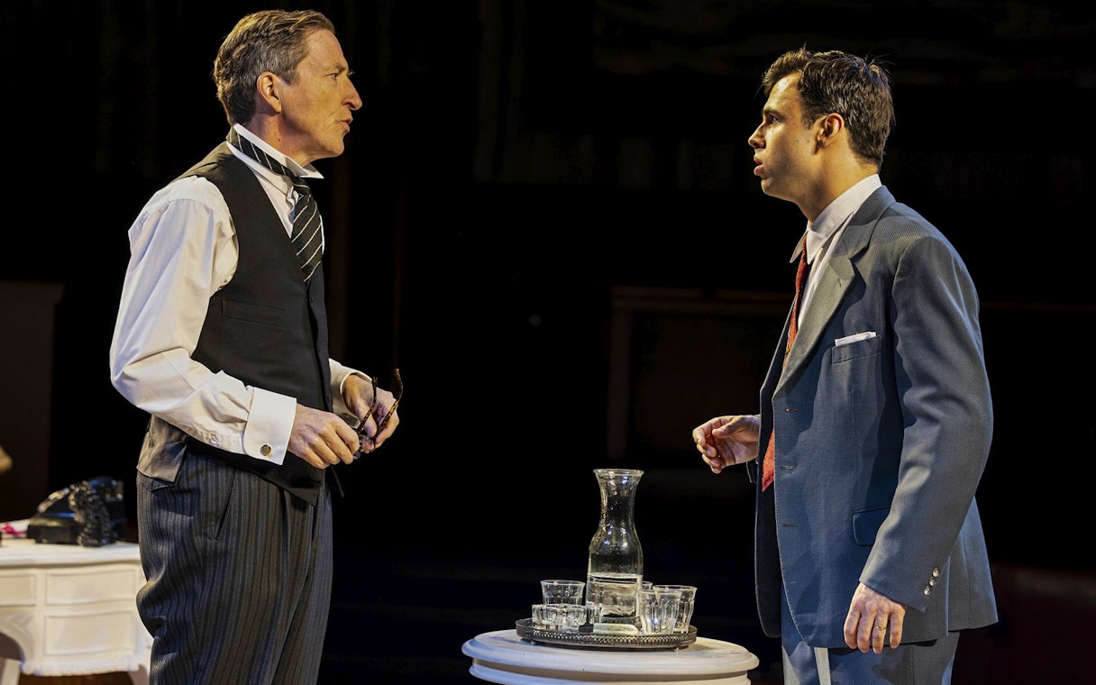 Stage scene from "Witness for the Prosecution" in West End with two actors in dialogue.