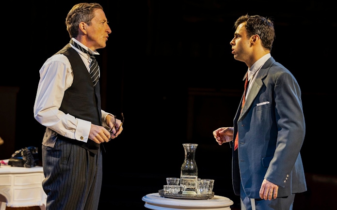 Stage scene from "Witness for the Prosecution" in West End with two actors in dialogue.