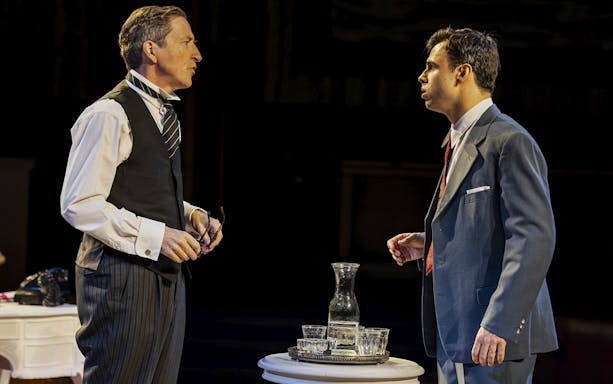 Stage scene from "Witness for the Prosecution" in West End with two actors in dialogue.