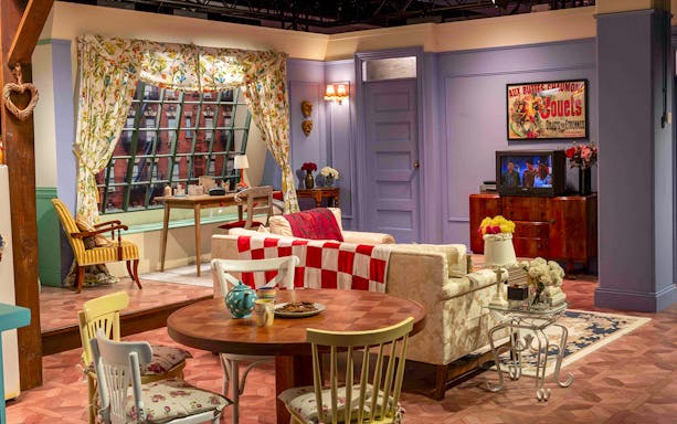 Monica's apartment set from FRIENDS™ with iconic window and furniture.