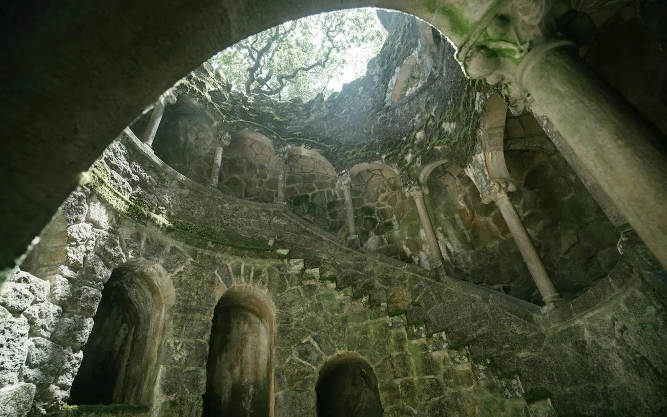 Quinta da Regaleira's Initiation Well with spiral staircase, Sintra, on a private half-day tour from Lisbon.