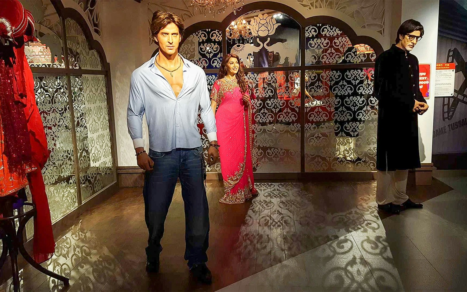 Wax figures at Madame Tussauds Singapore featuring Bollywood celebrities.