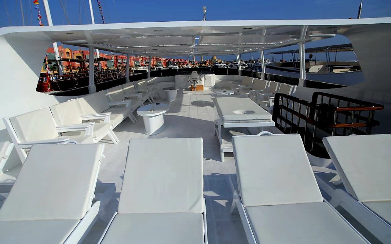 Yacht deck with lounge chairs, Orange Bay Island, Hurghada.