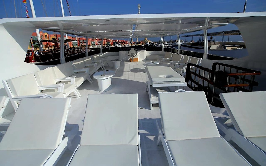 Yacht deck with lounge chairs, Orange Bay Island, Hurghada.