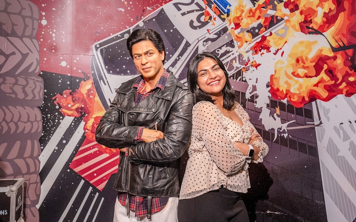 Shah Rukh Khan wax figure at Madame Tussauds Sydney with visitor.