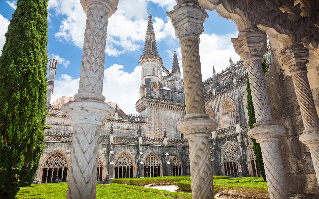 Batalha Monastery's ornate Gothic architecture with detailed arches and spires in Portugal.