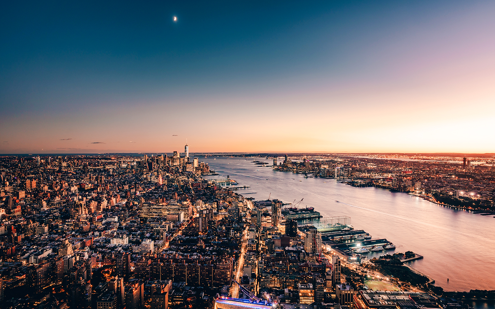 Southern view of New York City skyline from Edge at sunset, overlooking the Hudson River.