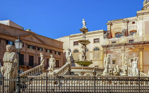 Fountain of Pretoria with statues in Palermo, Italy.
