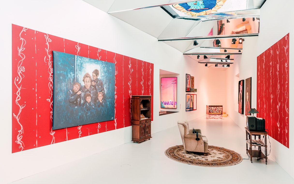 MAAT Gallery interior with contemporary art displays and seating area.