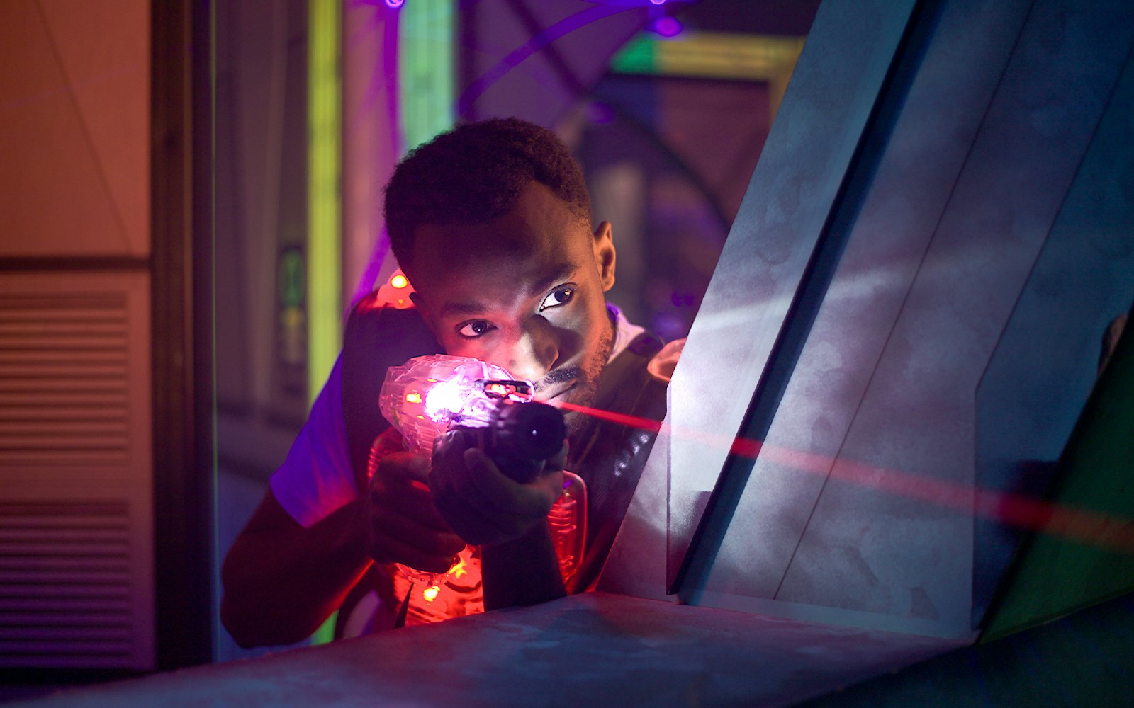 Participant playing laser tag at Orlando Wonderworks.