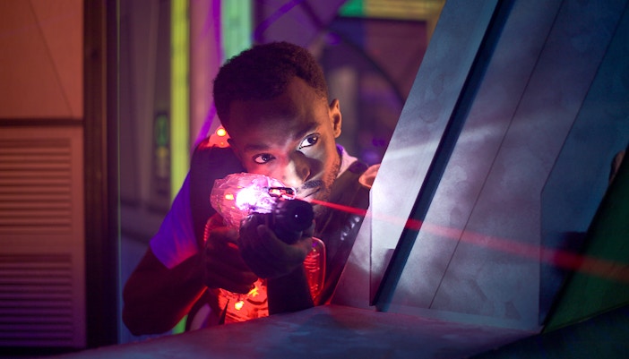 Participant playing laser tag at Orlando Wonderworks.