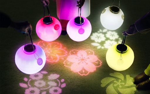 Lanterns illuminating cherry blossom patterns at NAKED Sakura Night Garden, Shinjuku Gyoen 2023.