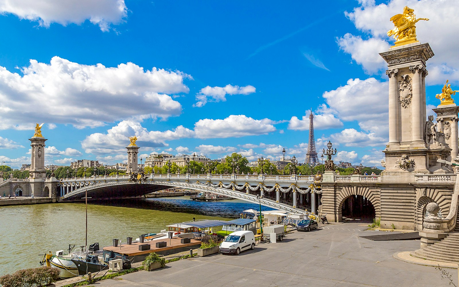 Pont Alexandre III bridge with Eiffel Tower in the background, Paris, France.