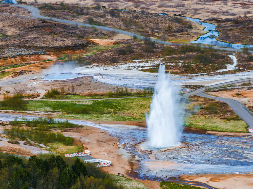 Geyser erupting in geothermal area on Golden Circle Day Tour, Reykjavik, Iceland.