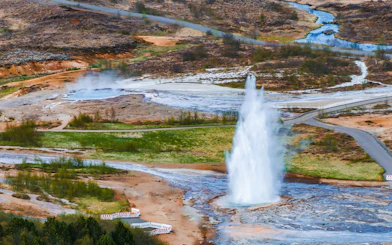 Geyser erupting in geothermal area on Golden Circle Day Tour, Reykjavik, Iceland.